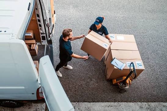 Packages being handled for dispatch and delivery